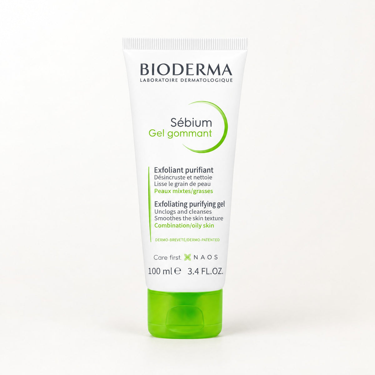 Tubo blanco con tapa verde del gel exfoliante Bioderma Sébium Gel Gommant de 100 ml