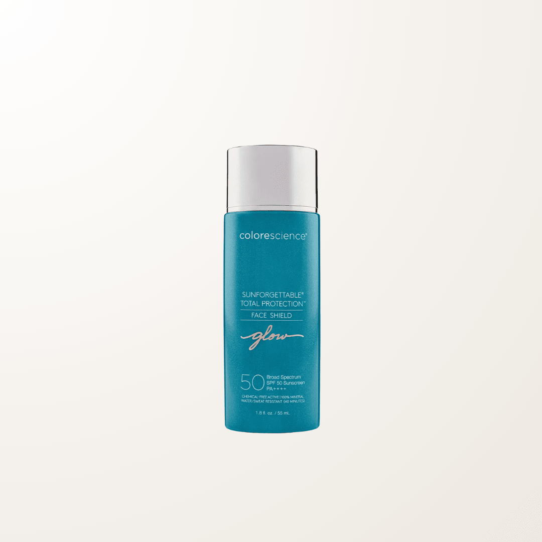 Fotoprotector fluido mineral Face Shield Glow SPF 50 con acabado iluminador y defensa ambiental integral.