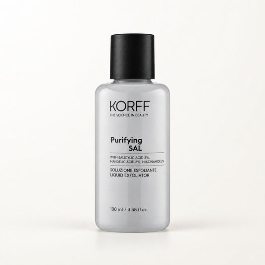 Frasco gris translúcido con tapa negra de Korff Purifying SAL, solución exfoliante 100 ml