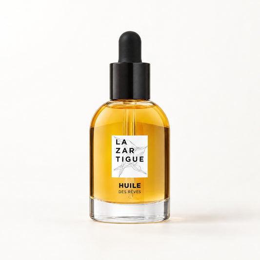 Frasco de vidrio con aceite ámbar y gotero negro, etiqueta blanca, Huile Des Rêves 50 ml La Zartigue