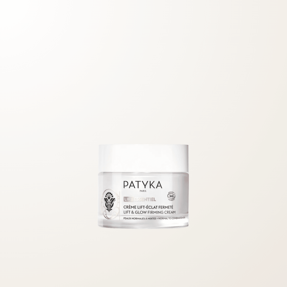 Tarro de cristal de la Crema Lift Luminosidad Firmeza de Patyka para pieles normales a mixtas, con textura gel-crema y certificación COSMOS Organic